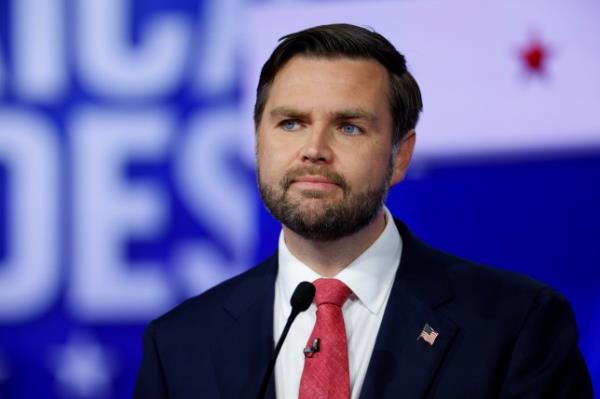 Republican vice presidential candidate Senator JD Vance stands and looks on at the CBS Broadcast Center on Tuesday in New York City